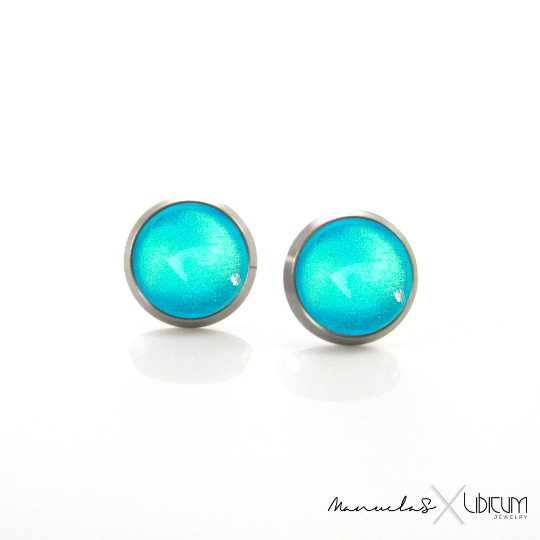 Turquoise titanium earrings in vibrant blue-green color, available in 8mm and 10mm sizes. Hypoallergenic, lightweight, and safe for sensitive ears.
titanium_earring  Magic  Jewelry  Ice queen  Green  Frozen  baby blue  Aqua  Bright colors  Bright  Summer  Summer jewelry  Blue  Sea  deep sea  Turquoise  titanium_earrings