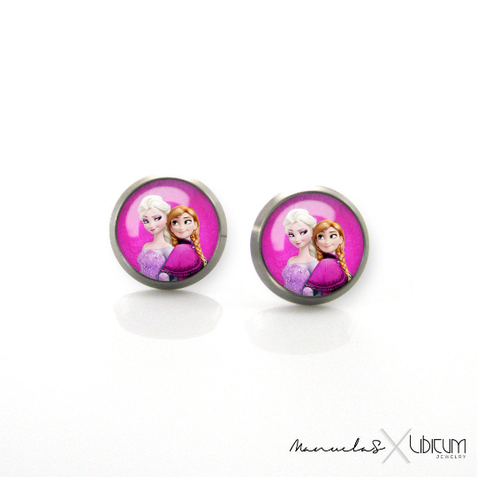 Pink Titanium Children's Earrings featuring Elsa and Anna from Frozen, available in 8mm or 10mm sizes. Hypoallergenic and adorned with enchanting characters for a touch of magical style in every wear."