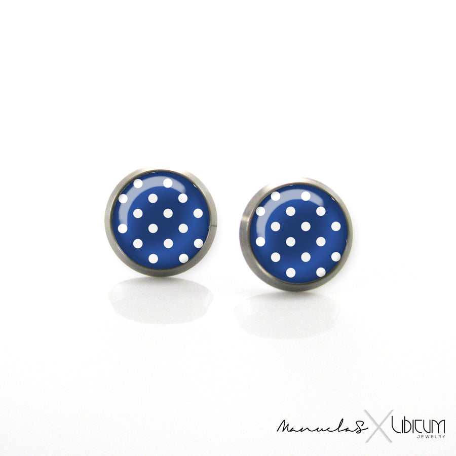 Navy-style titanium earrings featuring four summer-inspired patterns: white polka dots, blue polka dots, blue and white stripes, and a white anchor on a blue background. Available in 8mm and 10mm sizes.
