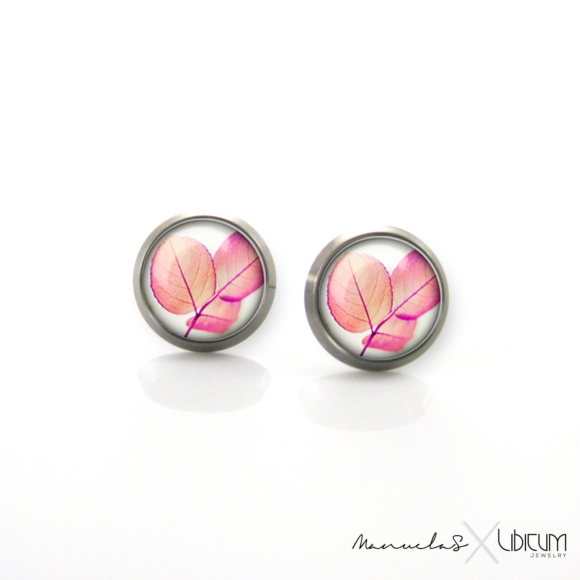 Pastel pink titanium earrings featuring a delicate branch and leaves design, available in 8mm and 10mm sizes. Lightweight, hypoallergenic, and durable for sensitive ears.