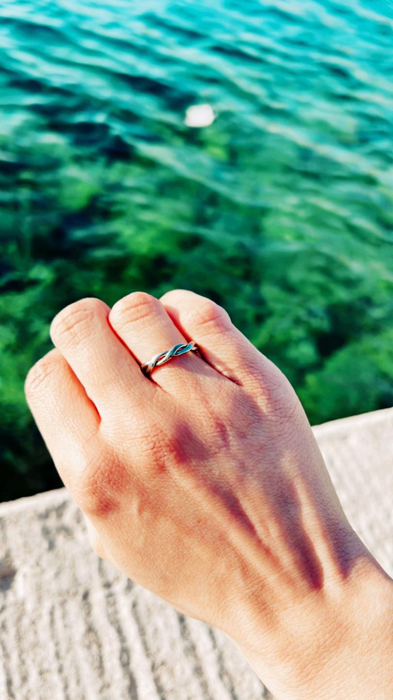 Pure titanium braided ring with intricate woven design. Lightweight, durable, hypoallergenic, and tarnish-resistant, suitable for sensitive skin