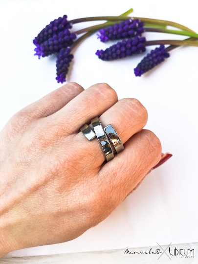 Pure titanium wrap-around ring with sleek, open-ended design. Lightweight, durable, hypoallergenic, and tarnish-resistant
