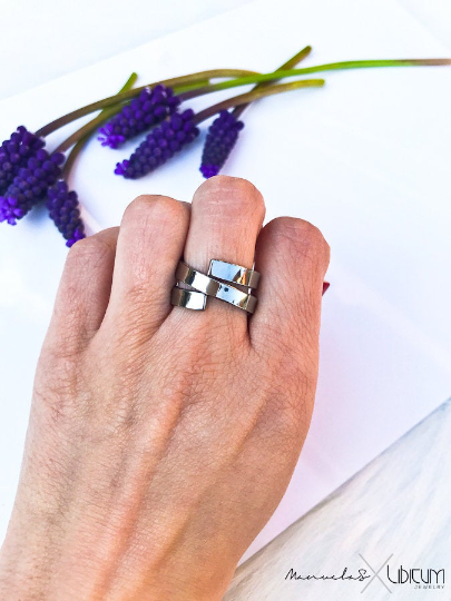 Pure titanium wrap-around ring with sleek, open-ended design. Lightweight, durable, hypoallergenic, and tarnish-resistant