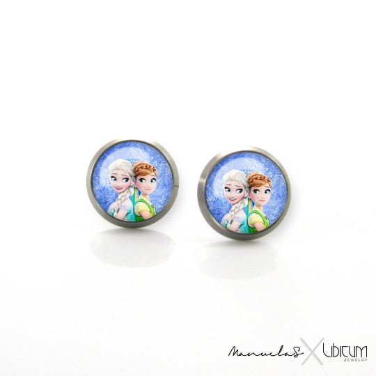 Light blue Titanium Children's Earrings featuring Elsa and Anna from Frozen, available in 8mm or 10mm sizes. Hypoallergenic and adorned with enchanting characters for a touch of magical style in every wear."
