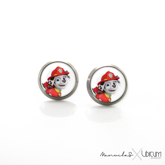 Titanium Children's Earrings featuring Marshall from Paw Patrol, available in 8mm and 10mm sizes. Crafted from hypoallergenic titanium for safe and stylish wear. Adorned with a playful image of Marshall, adding charm and whimsy to your child's accessory collection. Ideal for young fashion enthusiasts seeking comfort and adventure in every detail."