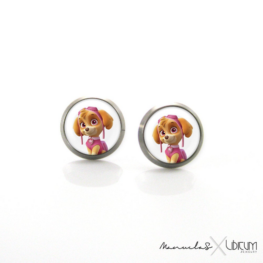 Titanium Children's Earrings featuring Skye from Paw Patrol, available in 8mm and 10mm sizes. Crafted from hypoallergenic titanium for safe and stylish wear. Adorned with a playful image of Skye, adding charm and whimsy to your child's accessory collection. Ideal for young fashion enthusiasts seeking comfort and adventure in every detail."